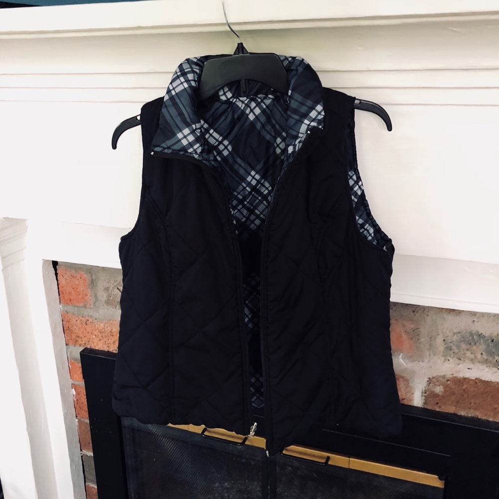 Reversible black and plaid puffer vest!